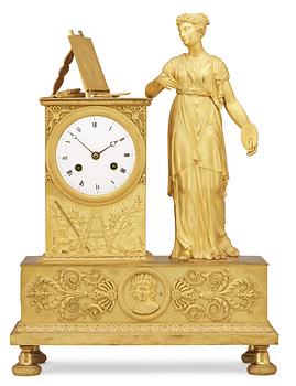 708. A French Empire early 19th century mantel clock.