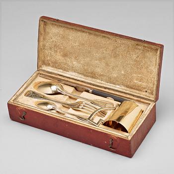 173. A five piece set of silver-gilt travel-cutlery, unidentifiable makers mark, Paris 1798-1809, in original box.