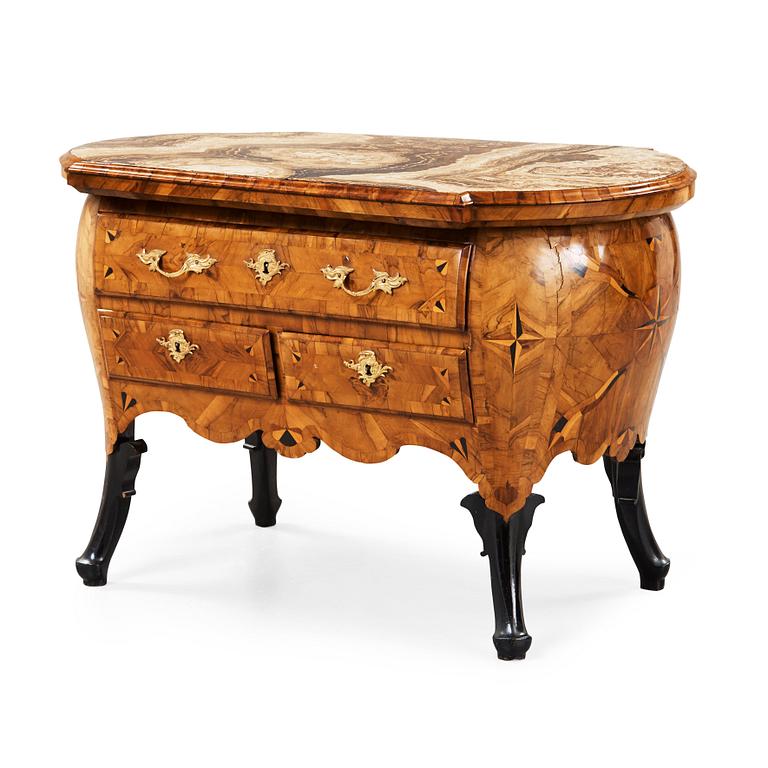 A Rococo mid 18th century commode, probably German.