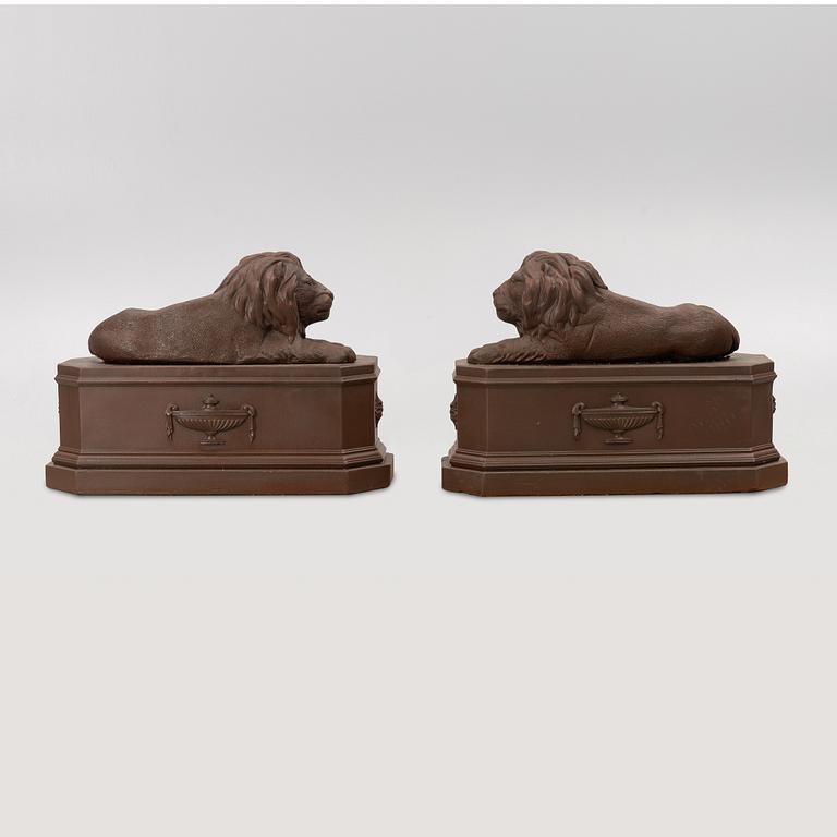 A pair of garden sculptures.