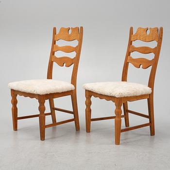 Henning Kjærnulf, a set of six oak 'Razorblade' chairs with new sheepskin upholstery, EGK, Denmark 1960s.