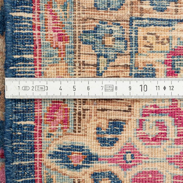 A carpet, Kerman, ca 358 x 275 cm.