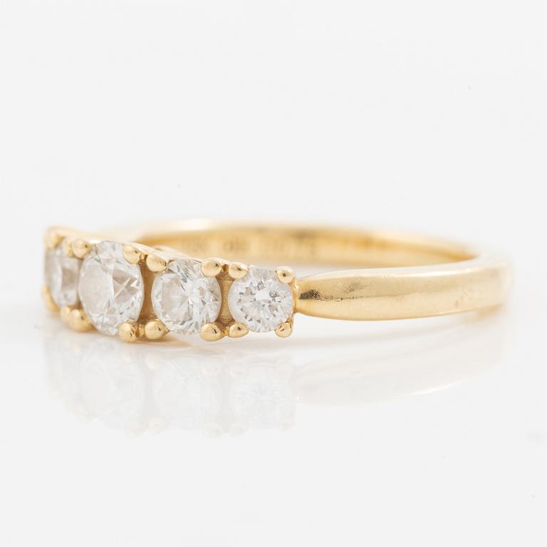 Ring in 18K gold set with five brilliant-cut diamonds, a total of 0.78 ct.