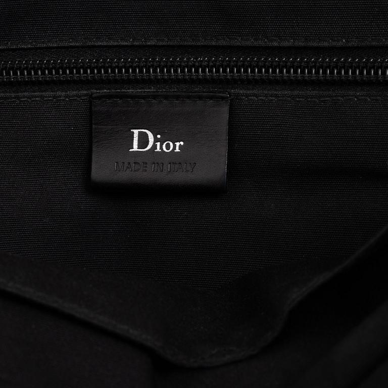 Christian Dior, a black leather briefcase.