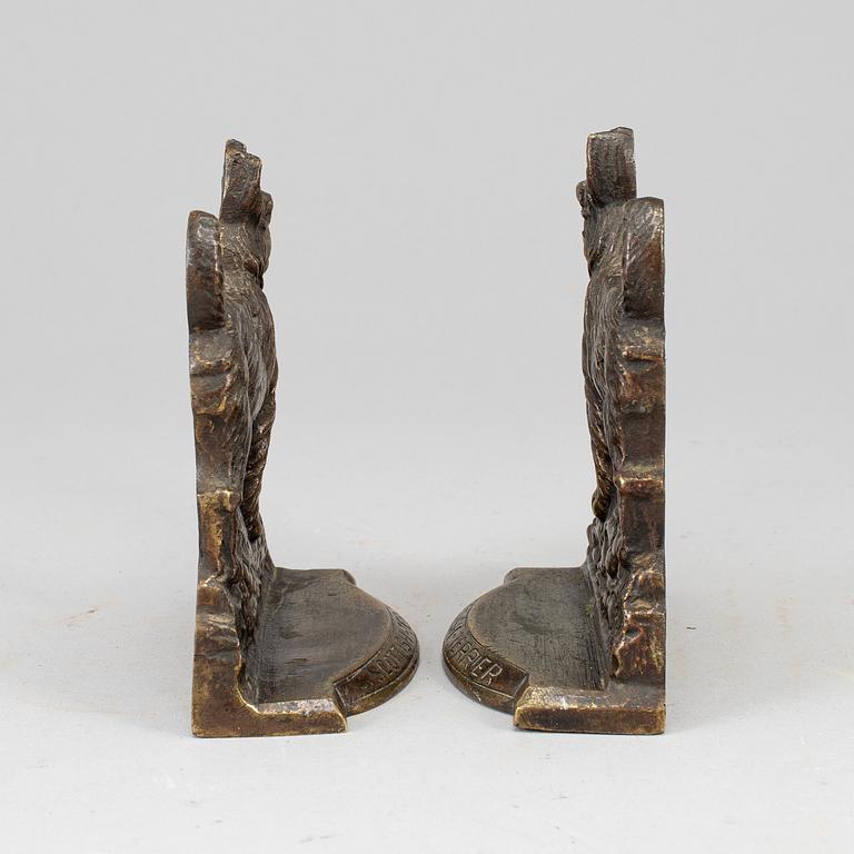 A pair of bronze 20th century book ends.