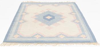 A flat weave carpet, signed GG, ca 236 x 161 cm.