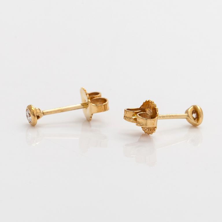 Tiffany & Co, Elsa Peretti, a pair of 18K gold 'Diamonds by The Yard' earrings with brilliant-cut diamonds.