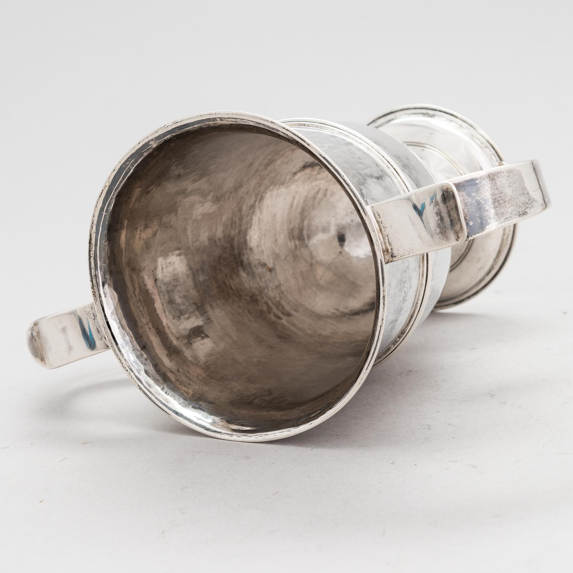 Joseph Lock, A sterling silver double handle goblet, London 1779.