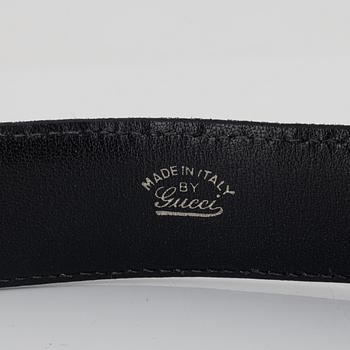 Gucci, two black leather belts, size 70-85.