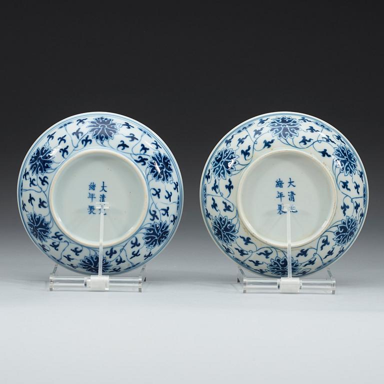 A pair of blue and white lotus dishes, Qing dynasty, Guangxu mark and period (1874-1908).