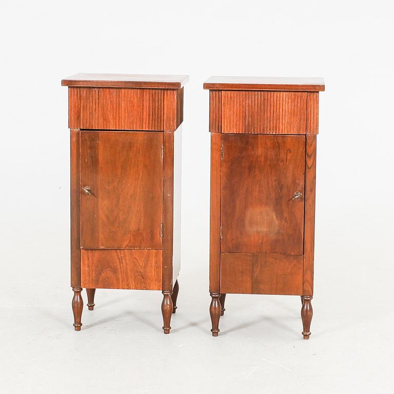 A pair of walnut Louis XVI style bedside tables first half of the 20th century.