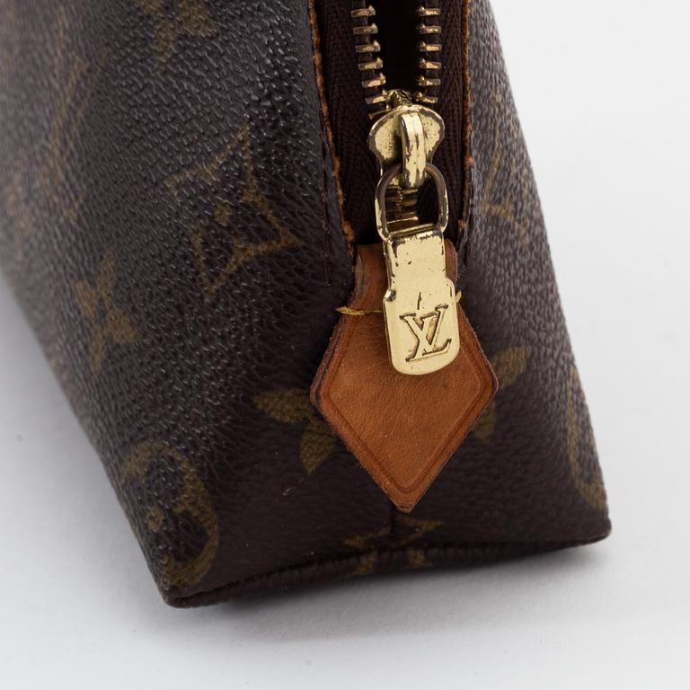 Louis Vuitton, a monogram canvas toilet bag and a sunglasses case.