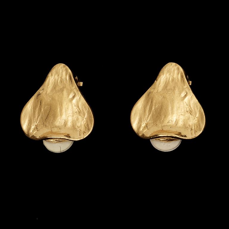 A pair of earrings by Yves Saint Laurent.
