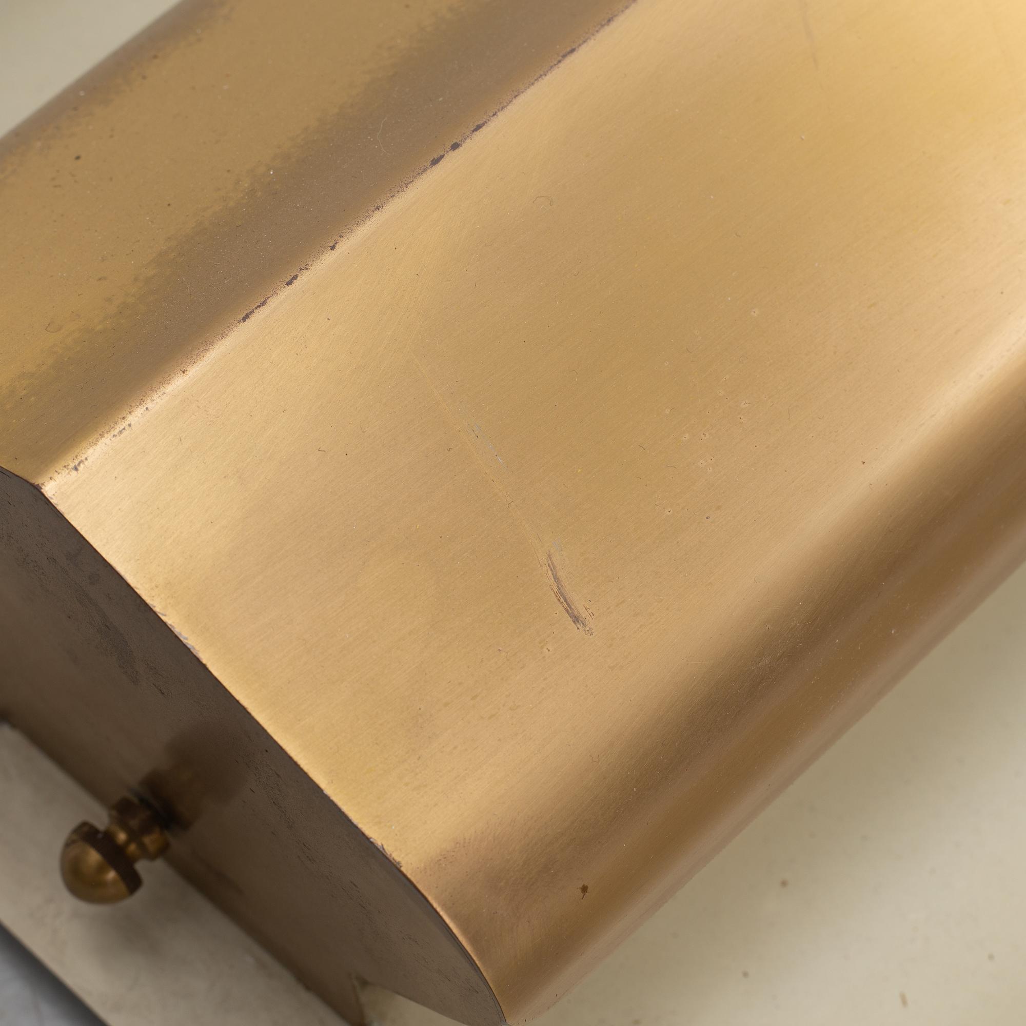 A Swedish Modern brass wall light, 1940's/50's.