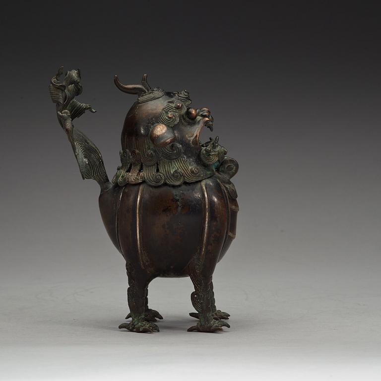 A bronze censer in the shape of a buddhist lion, Qing dynasty (1644-1912).