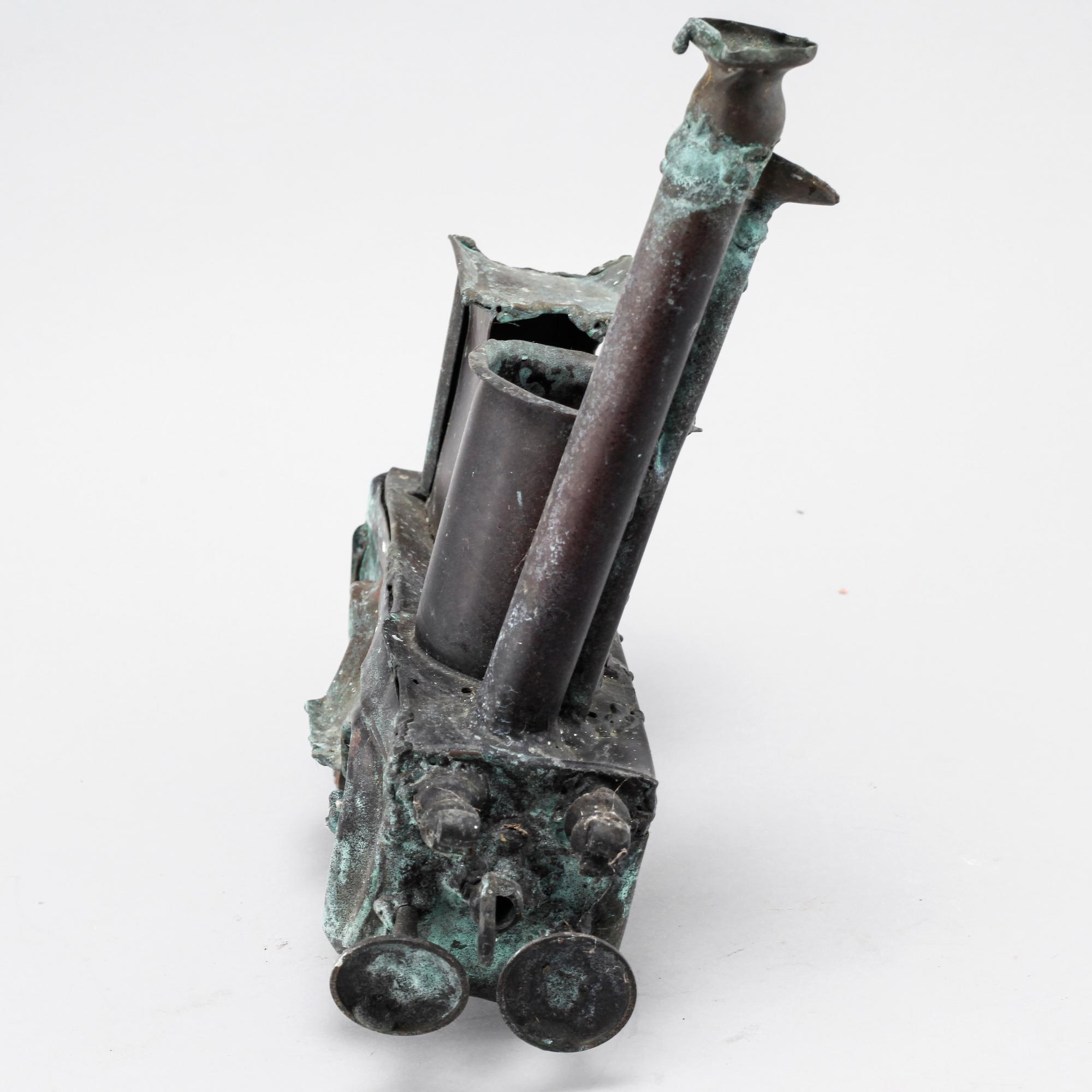 a metal sculpture, not signed.