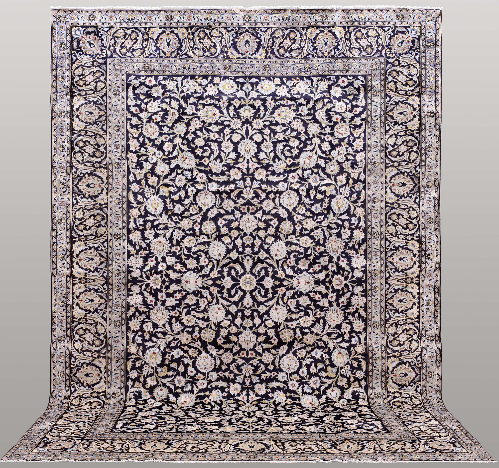 A carpet, Kashan, signed, ca 410 x 292 cm.