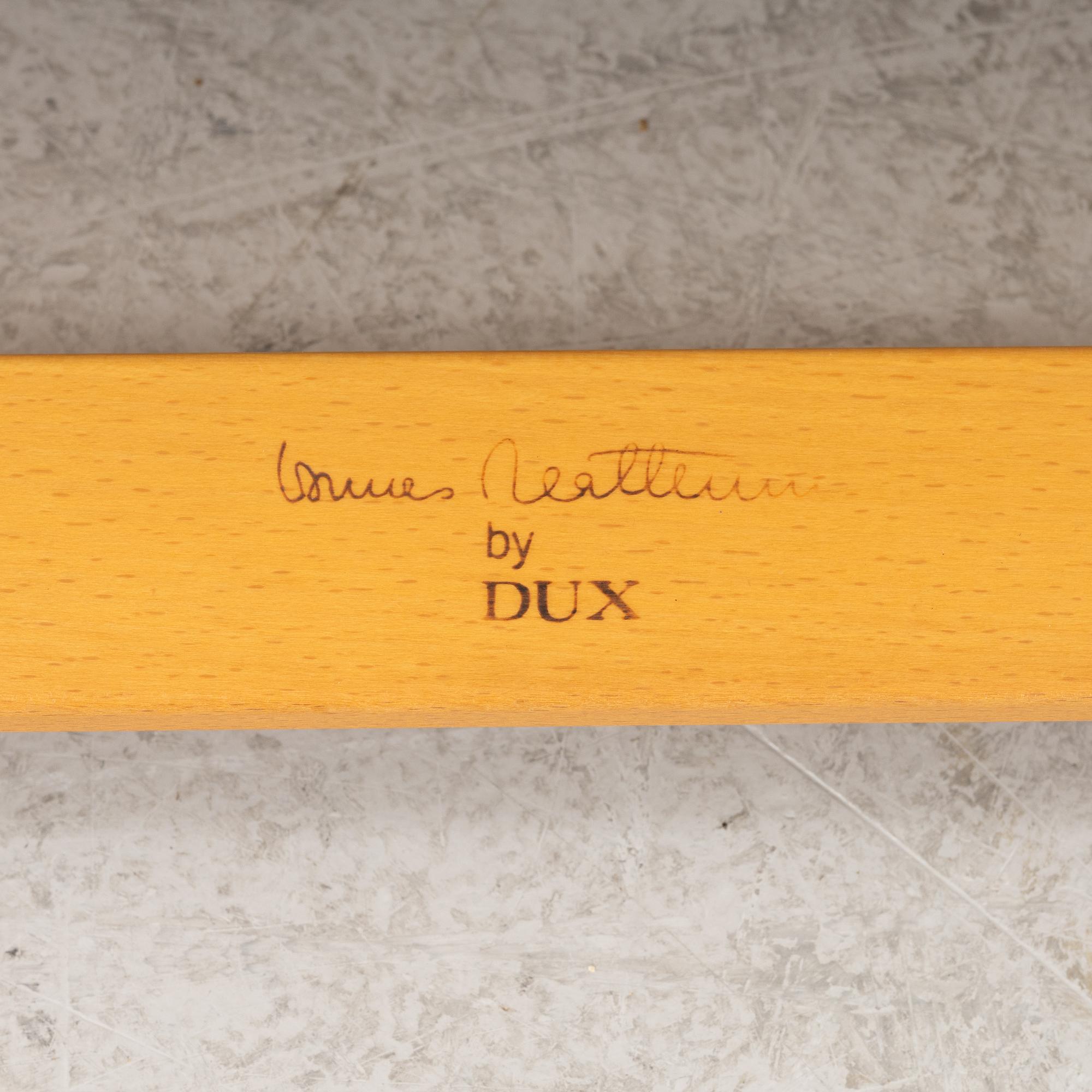 Bruno Mathsson, a pair of 'Ingrid' armchairs, Dux, Sweden, second half of the 20th century.