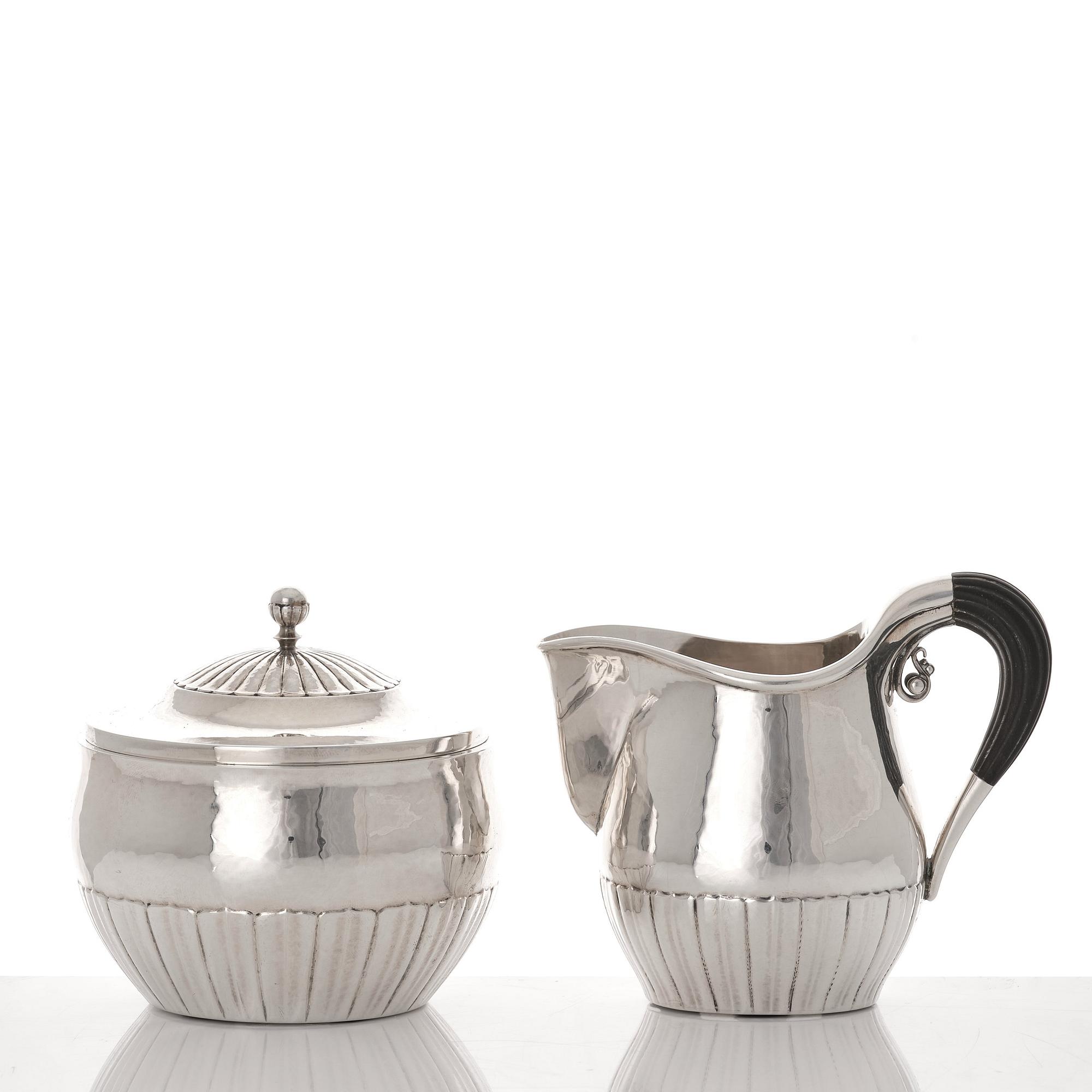 Johan Rohde, a three pieces sterling silver coffee service "Cosmos", Georg Jensen, Copenhagen 1945-77, design nr 45 A + D.