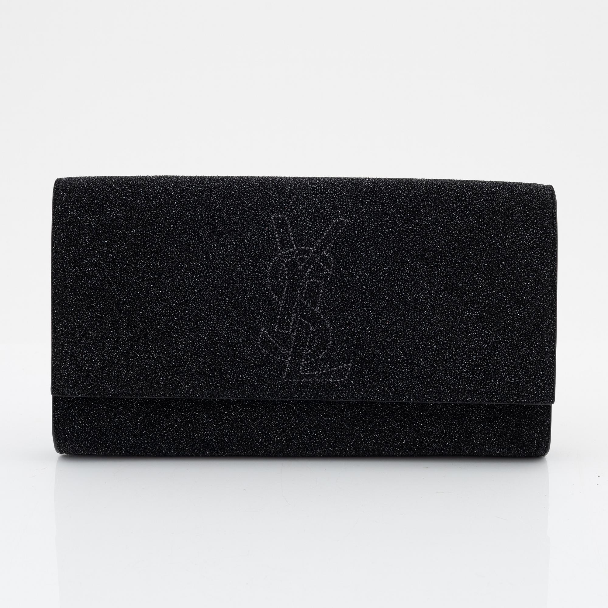 Yves Saint Laurent, a sparkly black leather clutch.