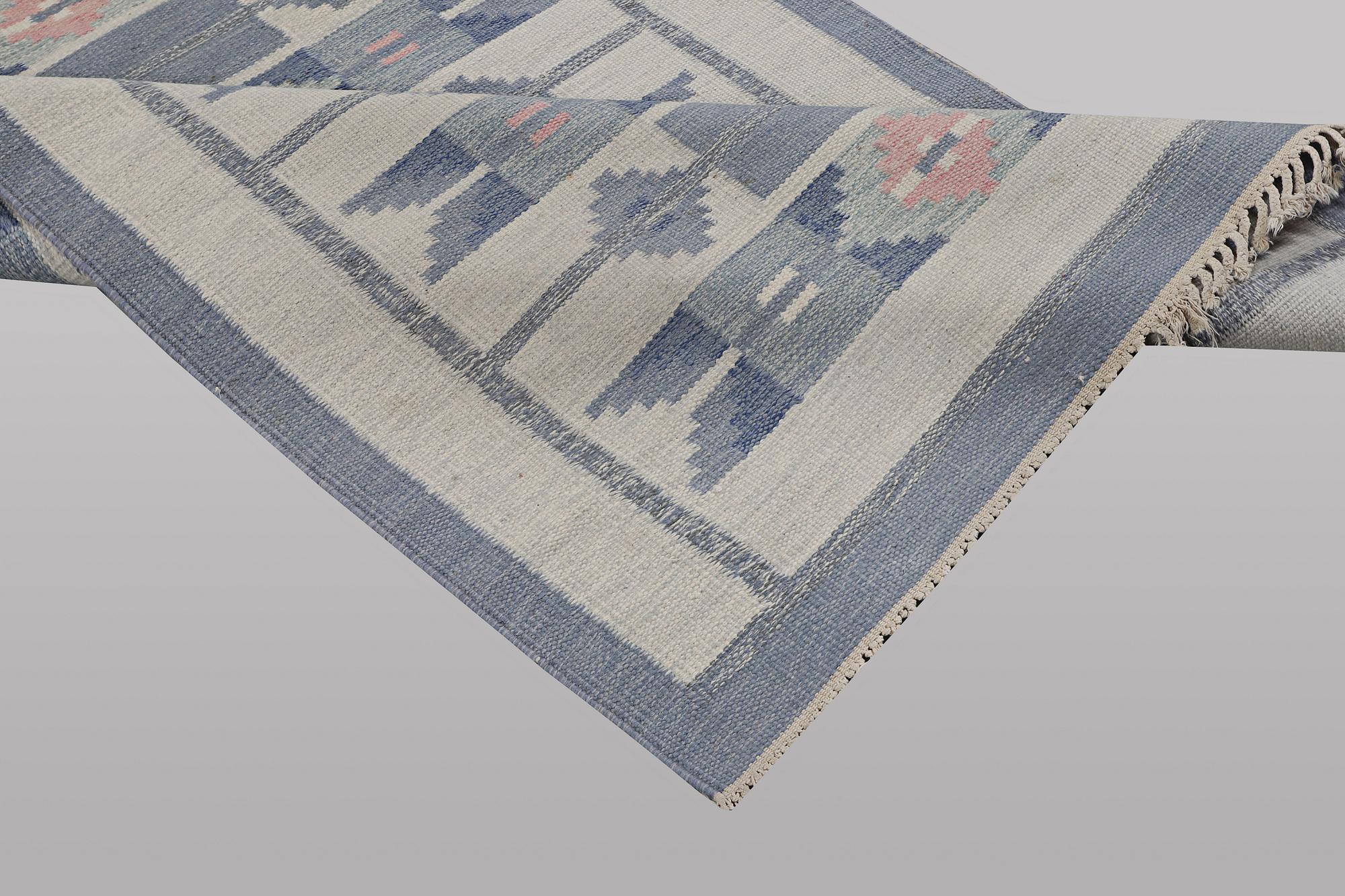 Ingegred Silow, a flat weave carpet, signed IS, ca 197 x 137 cm.