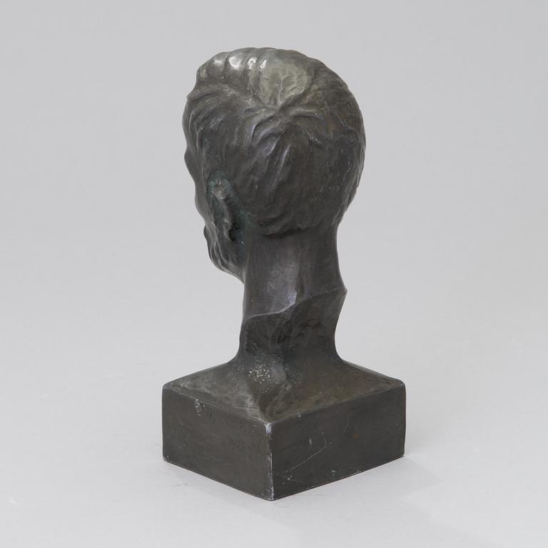 A bronze sculpture, signed and dated 1927-35.