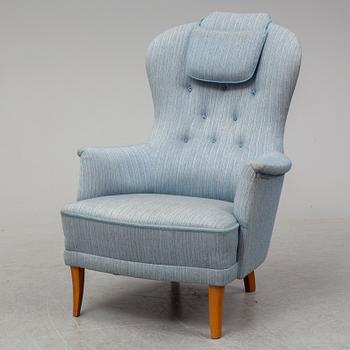 A second half of the 20th Century armchair by Carl Malmsten.