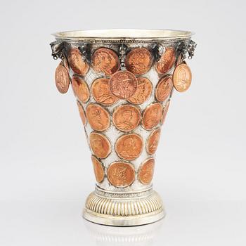 A Swedish 18th century parcel-gilt silver coin-beaker.