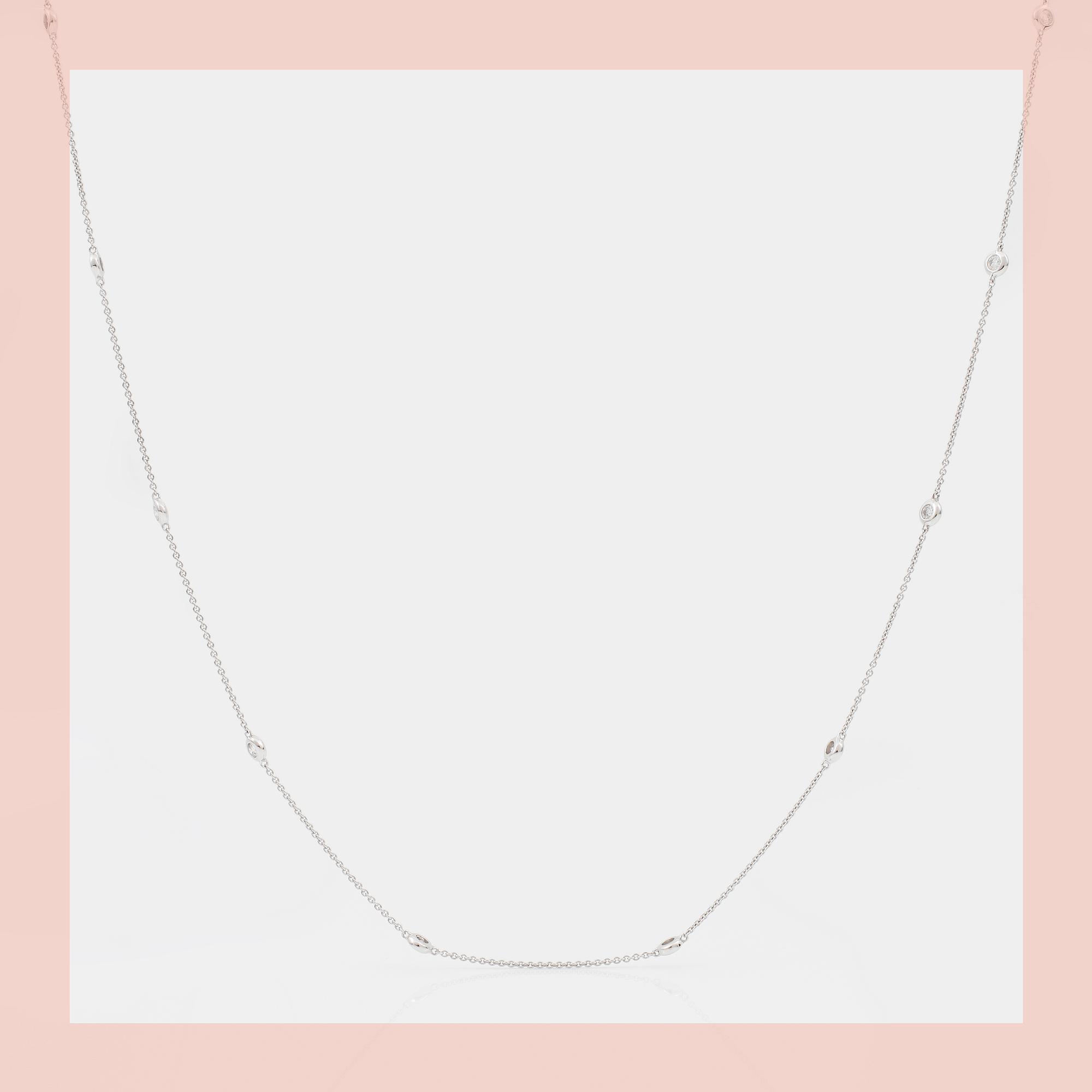 HALSBAND, 80cm kedja med 21 briljanter, totalt ca 0.95ct.