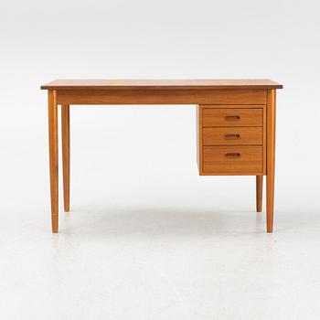A teak veneered desk, 1950's/60's.