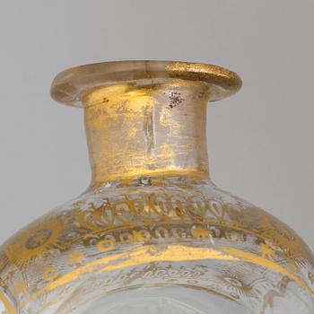 A first half of the 19th century wooden casket containing 6 flasks 2 glasses.