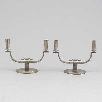 A pair of pewter candelabra by Carl Einar Borgström, Ystad Metall, marked CEB.