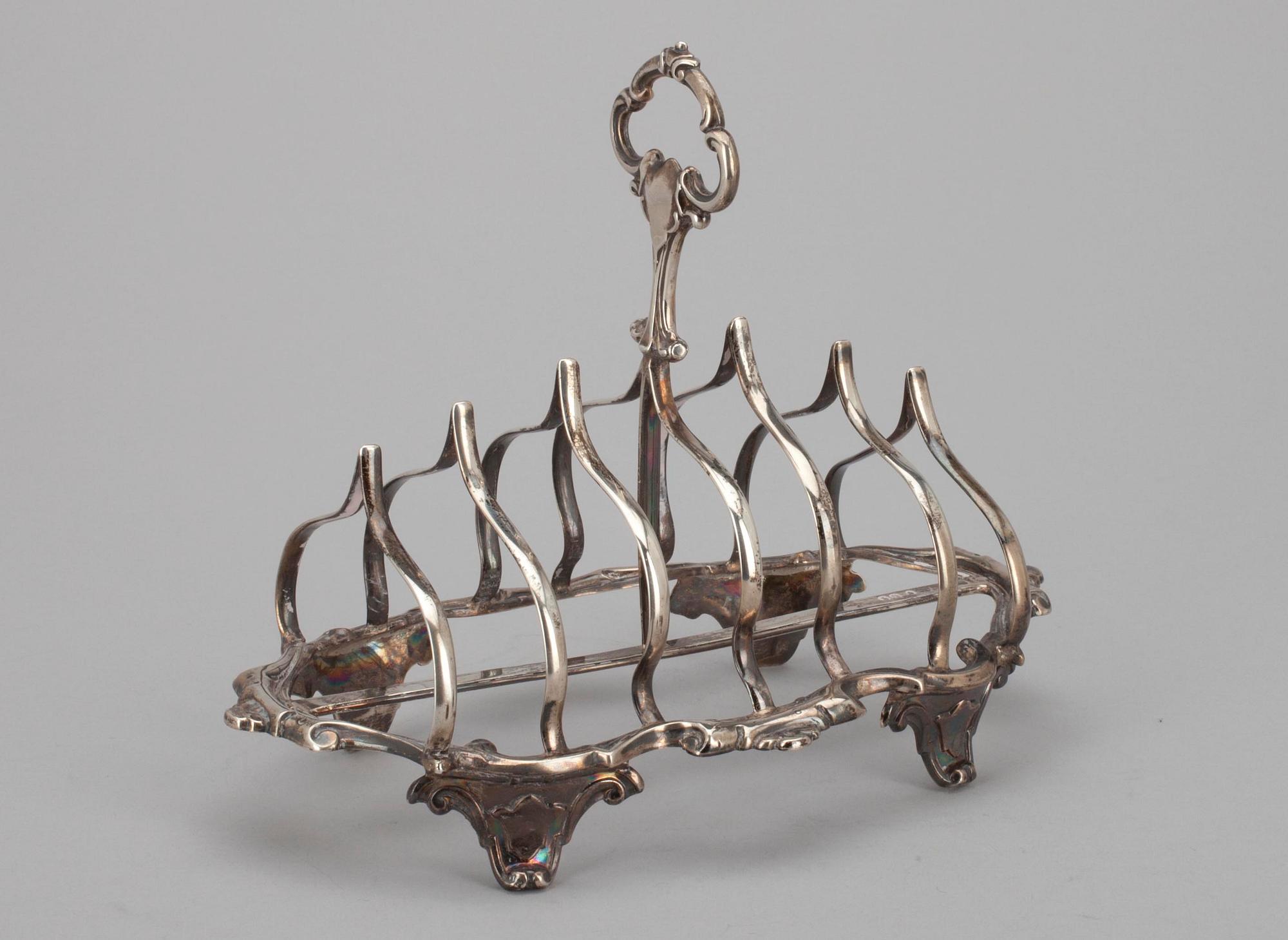 TOASTRACK, silver, London 1859. Vikt 274 g.