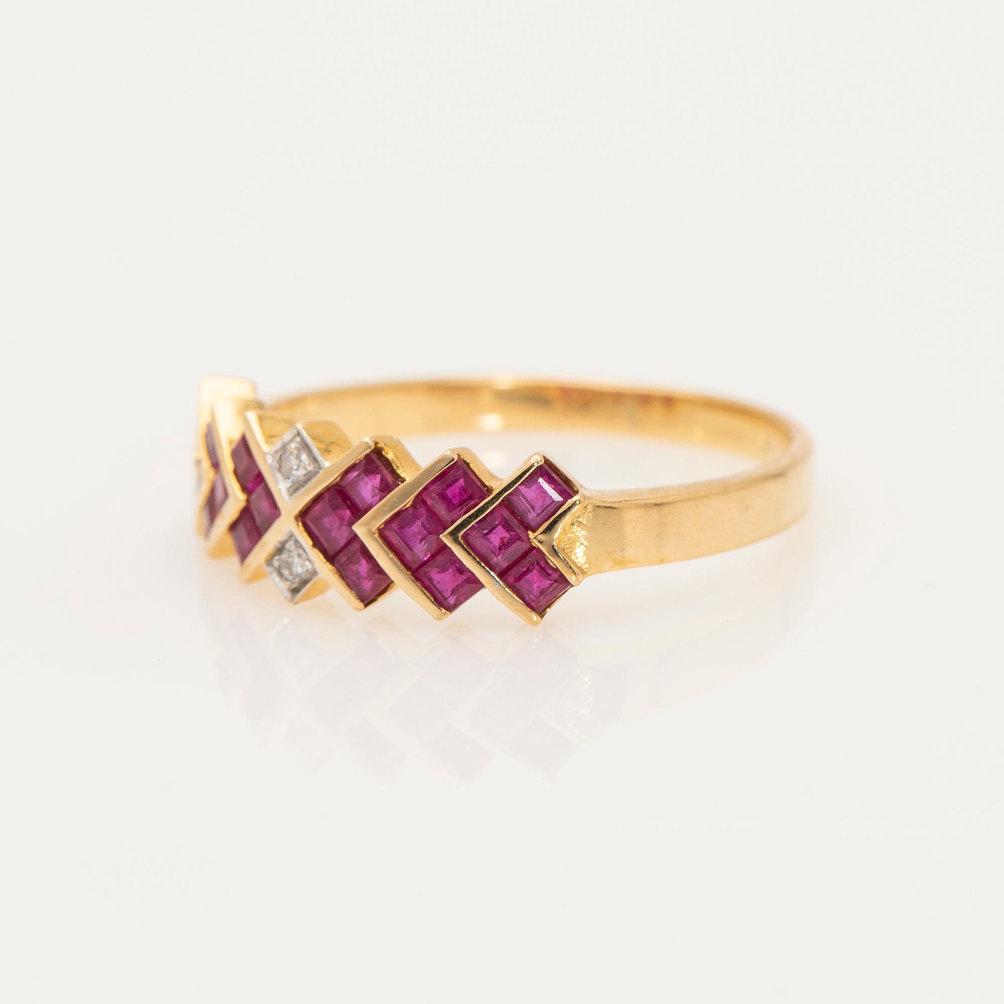 Ring, 18K gold with rubies and diamonds.