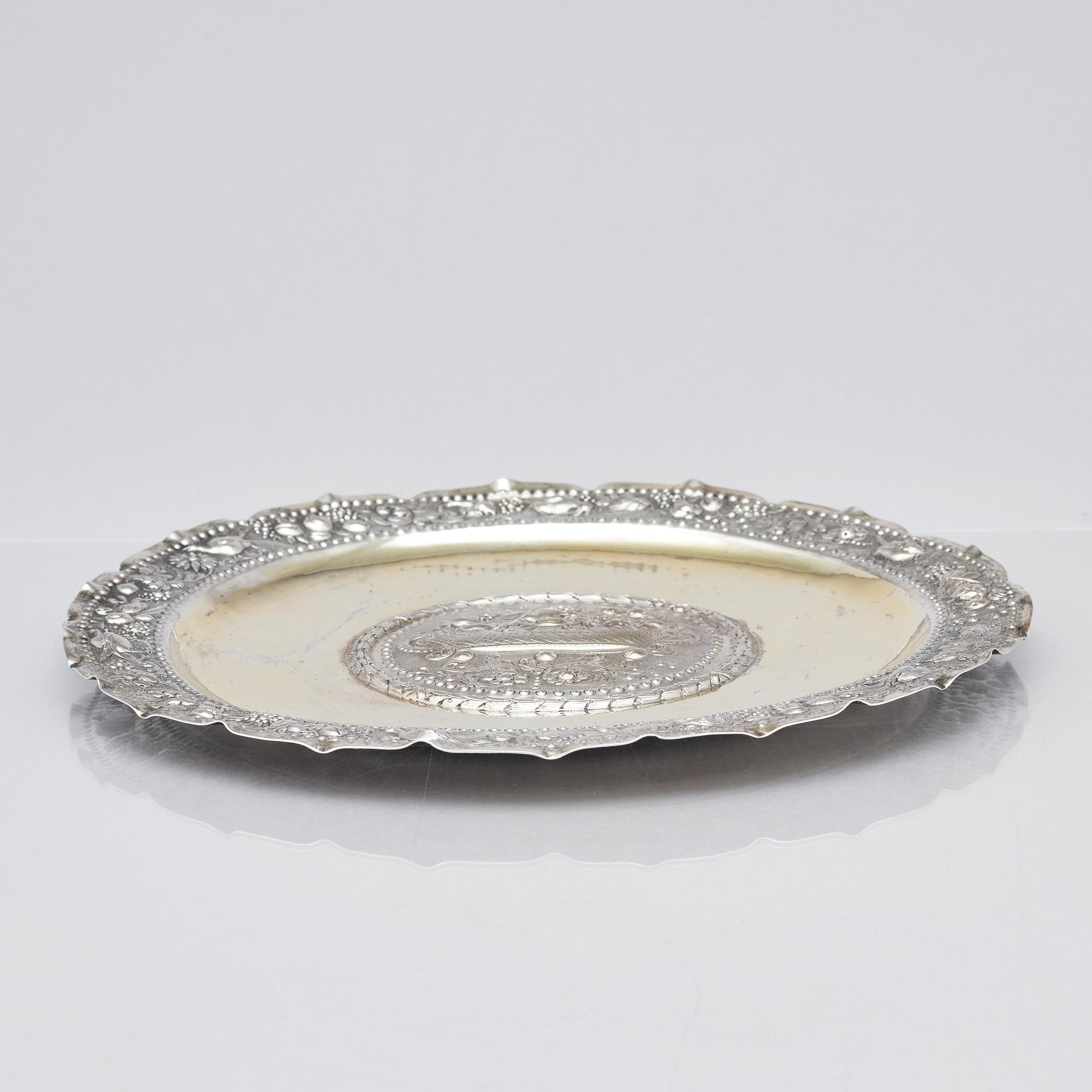 A Swedish early 18th century parcel-gilt dish, mark of Arnold van der Hagen, Norrköping (1695-1740(-42)).