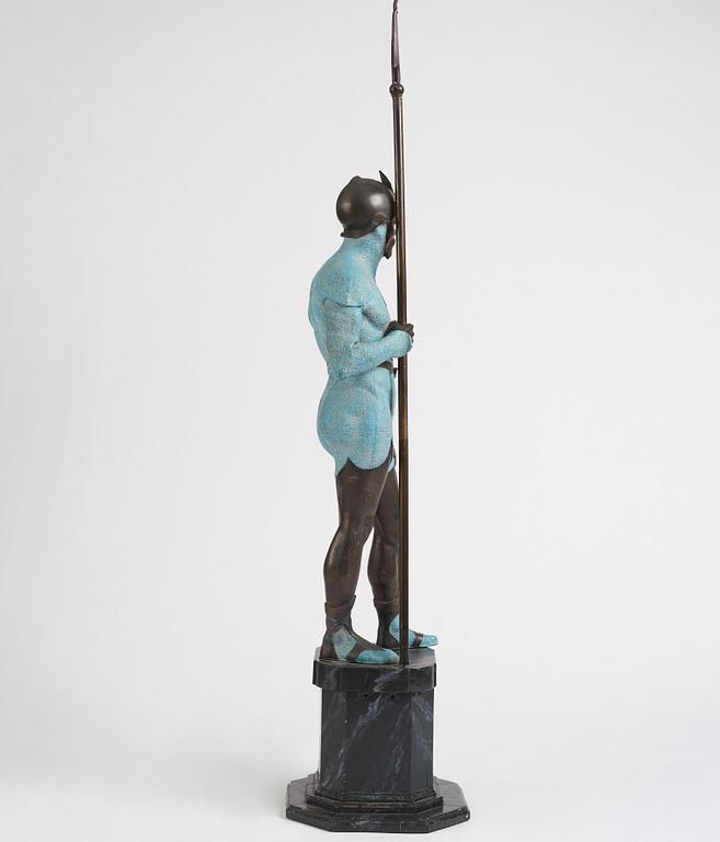 A bronze sculpture of a man in armour, late 19th century.