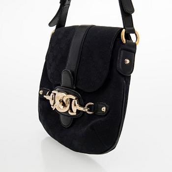 Gucci, a handbag.