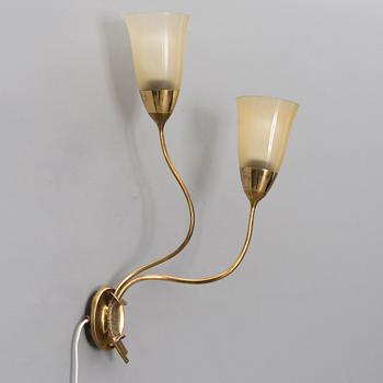 A 1940s wall light for Taito Oy, Finland.