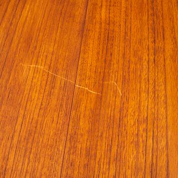 A teak-veneered dining table, mid 20th century.