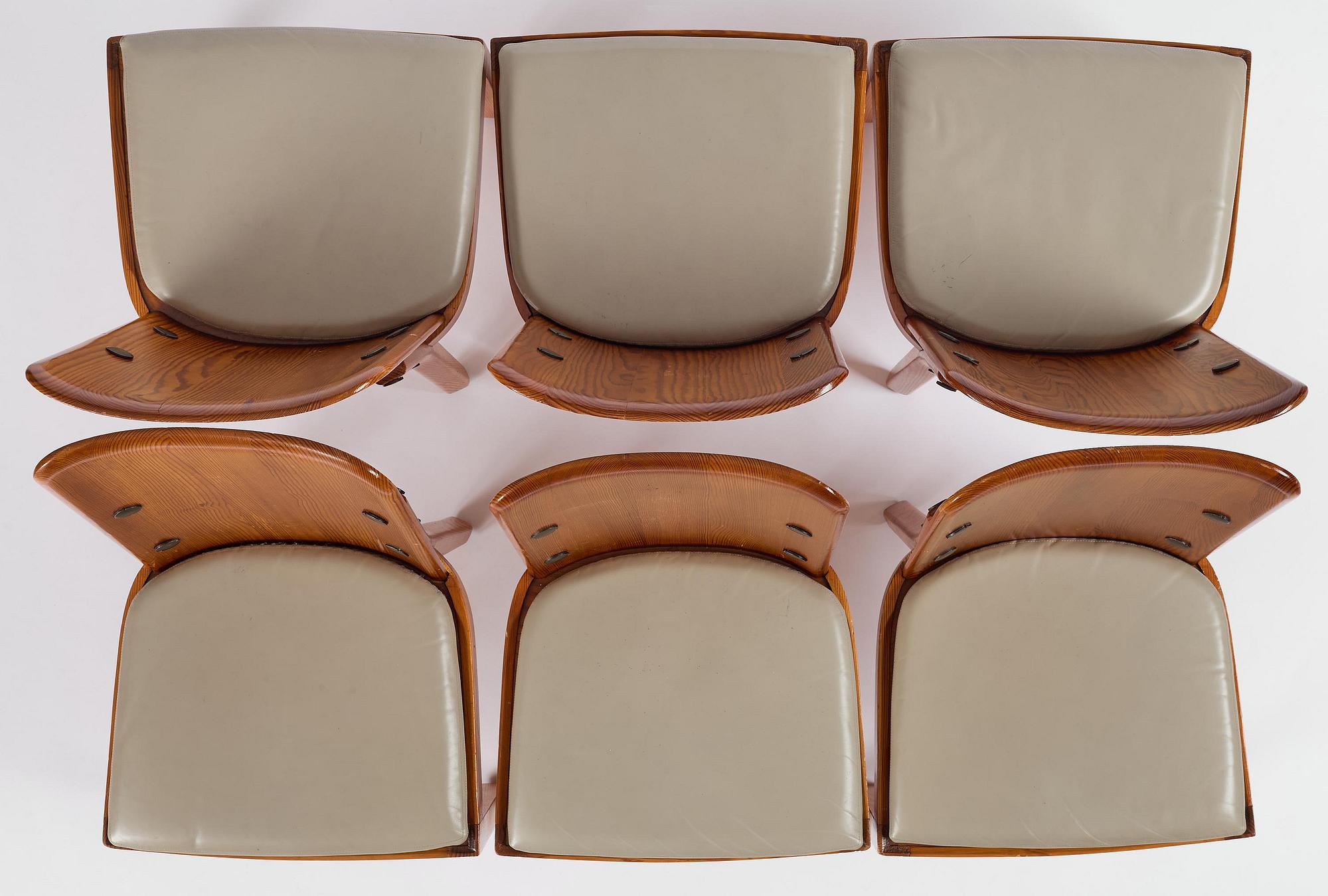 Axel Einar Hjorth, a set of ten stained pine "Lovö" chairs, Nordiska Kompaniet, Sweden, 1930s.