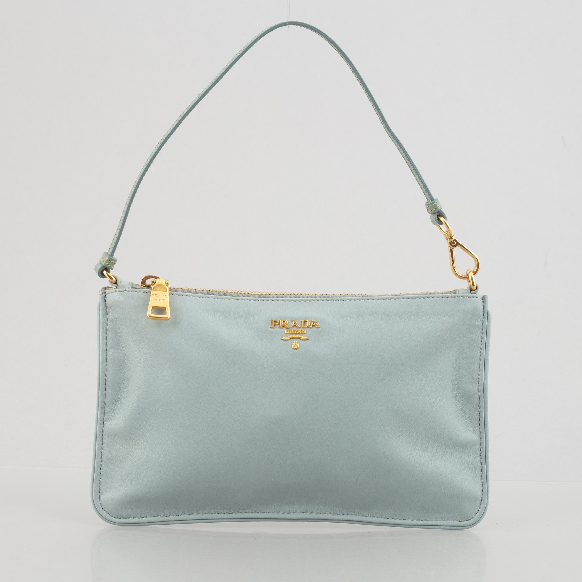 Prada, bag/clutch.