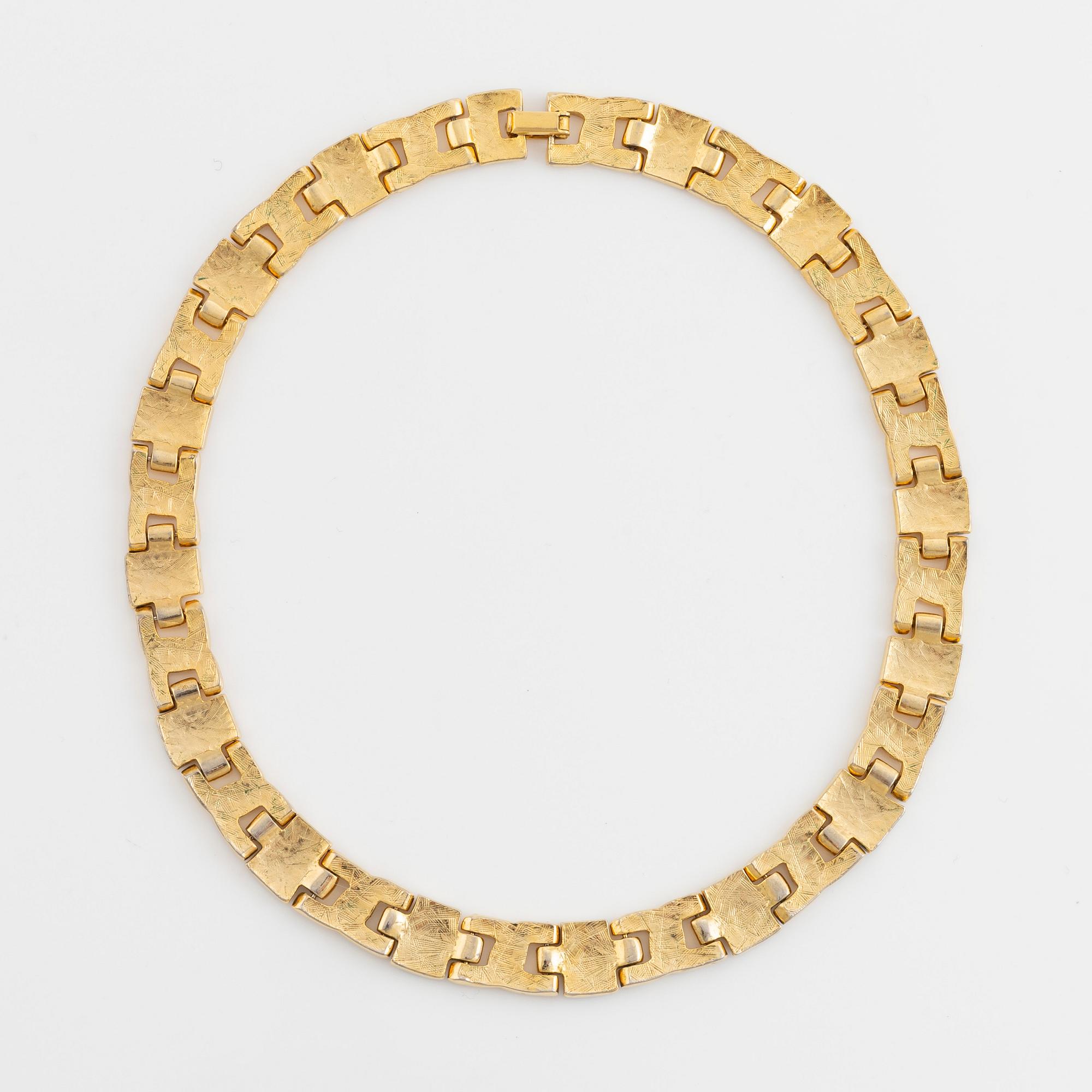 Oscar de la Renta bracelet, yellow metal with strass.