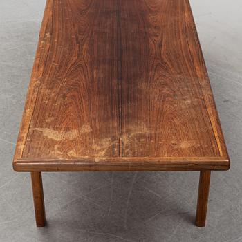 A 1950's/60's rosewood veneered coffee table.