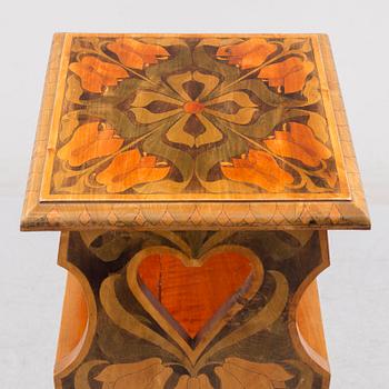 An early 20th century art nouveau shelf.