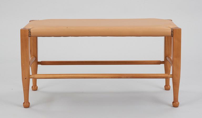 A Josef Frank mahogany and brown leather bench, Svenskt Tenn, model 2009.
