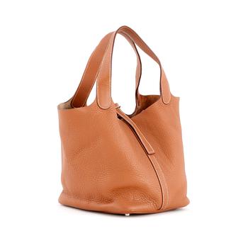 385. HERMÈS, a étoupe leather bag, "Picotin Lock".