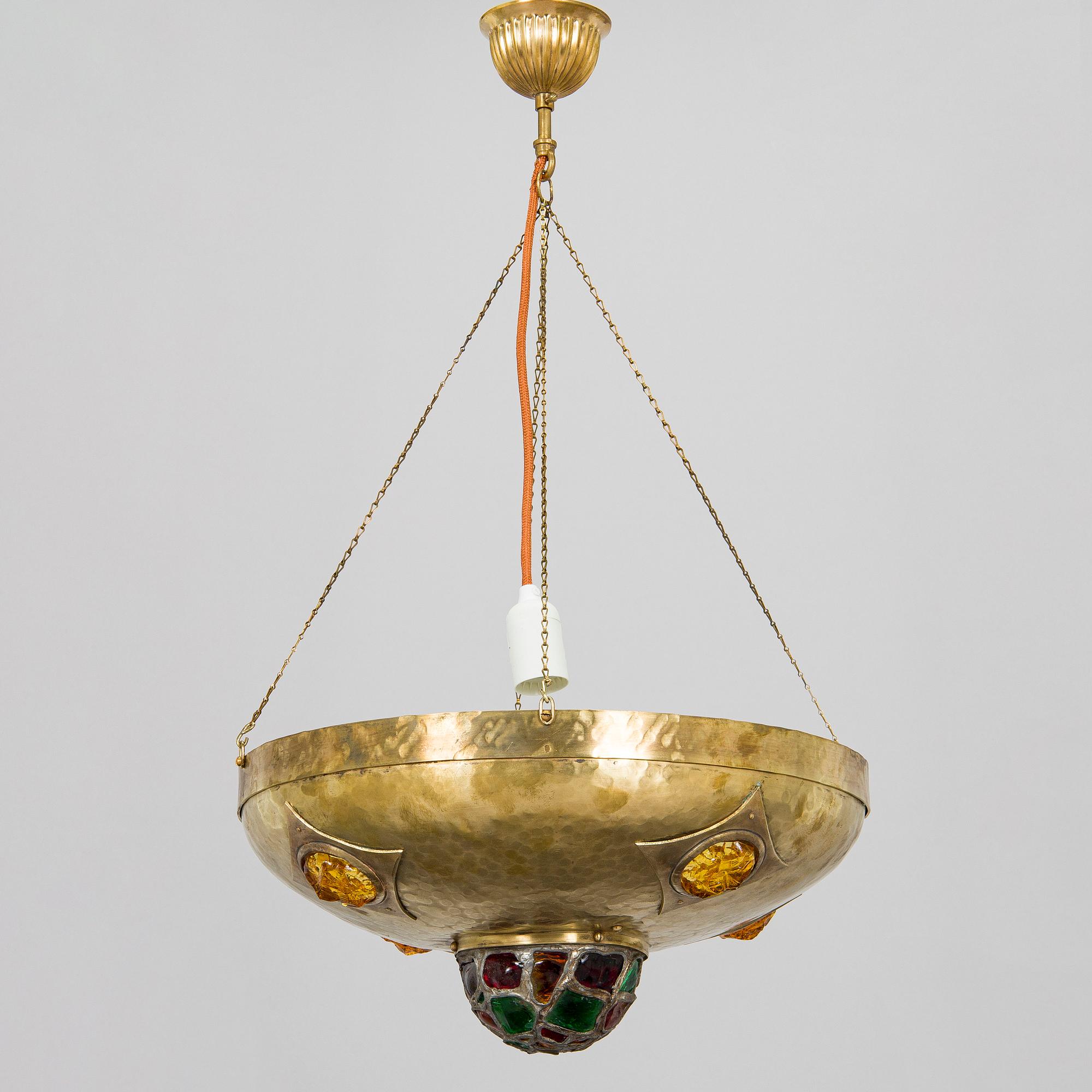 Kattovalaisin, 1900-luvun alku.