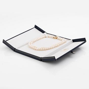 Pearl necklace, double-stranded with cultured freshwater pearls, clasp 18K gold set with aquamarine and cultured pearls, Jarl Sandin.