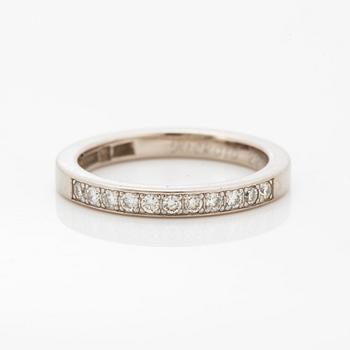 Brilliant-cut diamond half eternity ring.