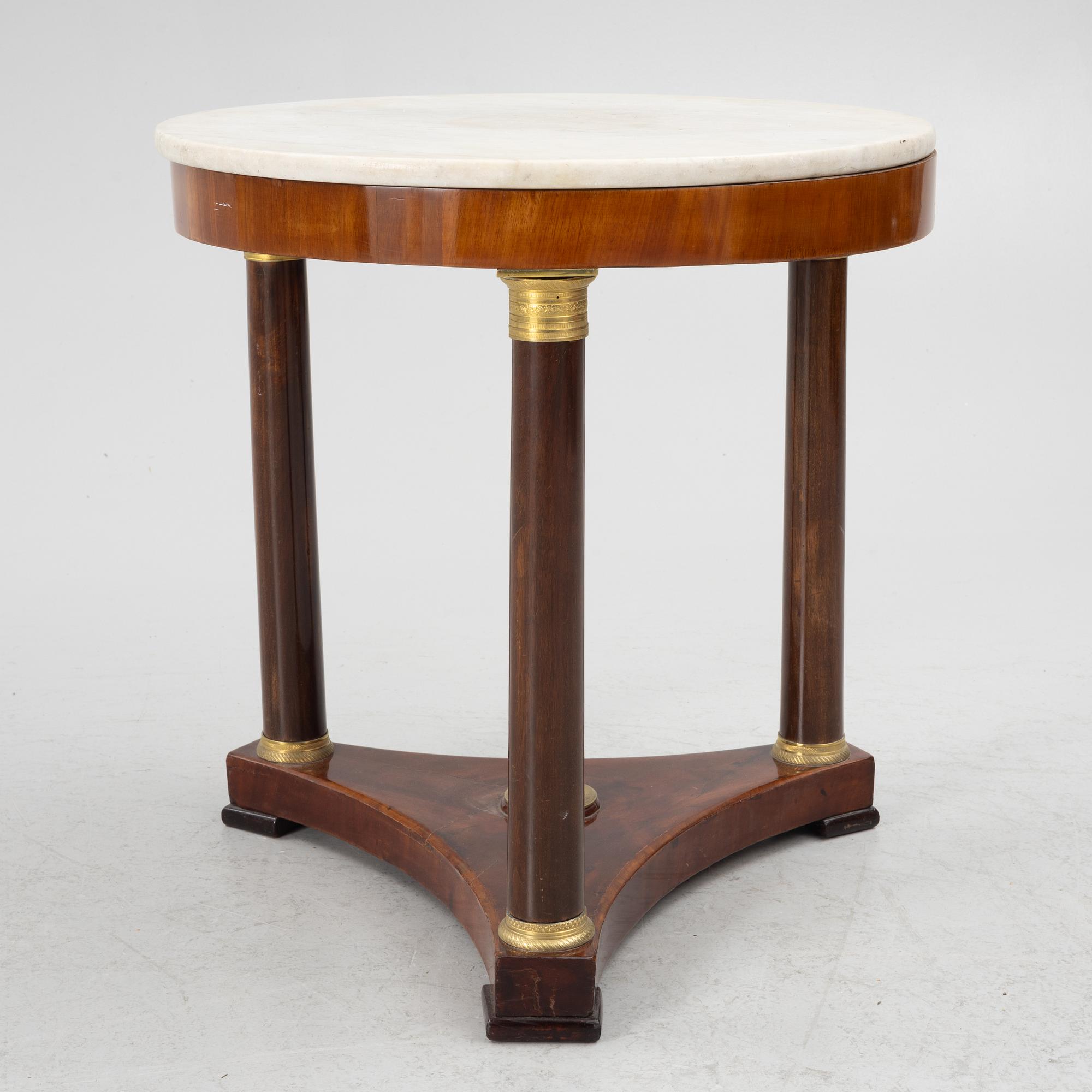 A Empire table, 19th Century.